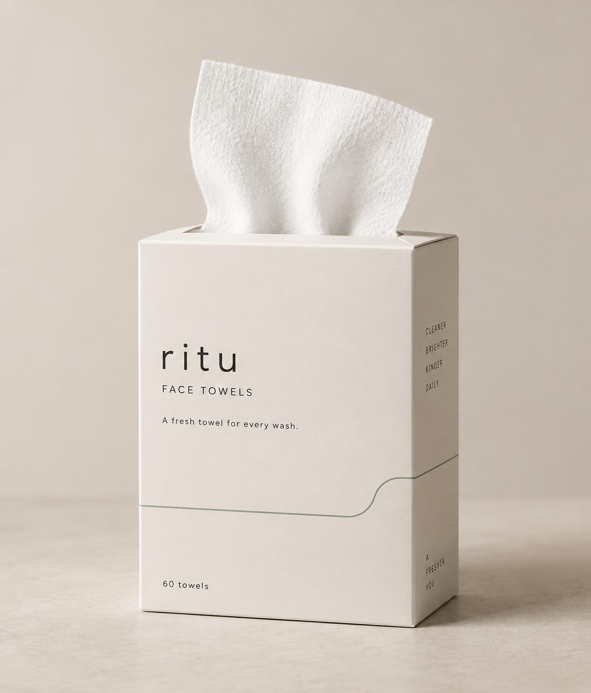 RITU Face Towels box in bone white with one soft towel partially pulled from the top